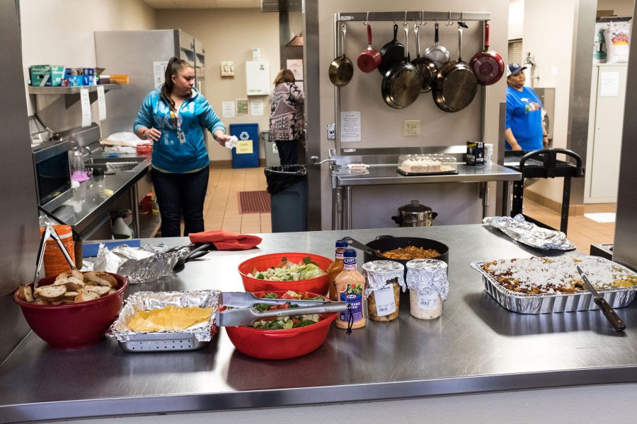 image of people cooking in kitchen